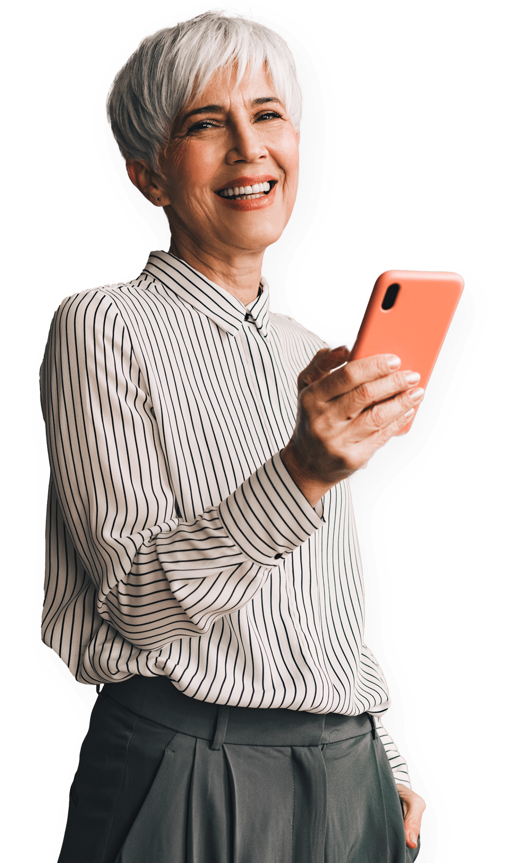 An older woman holding her phone smiling while using the Everyday app. 